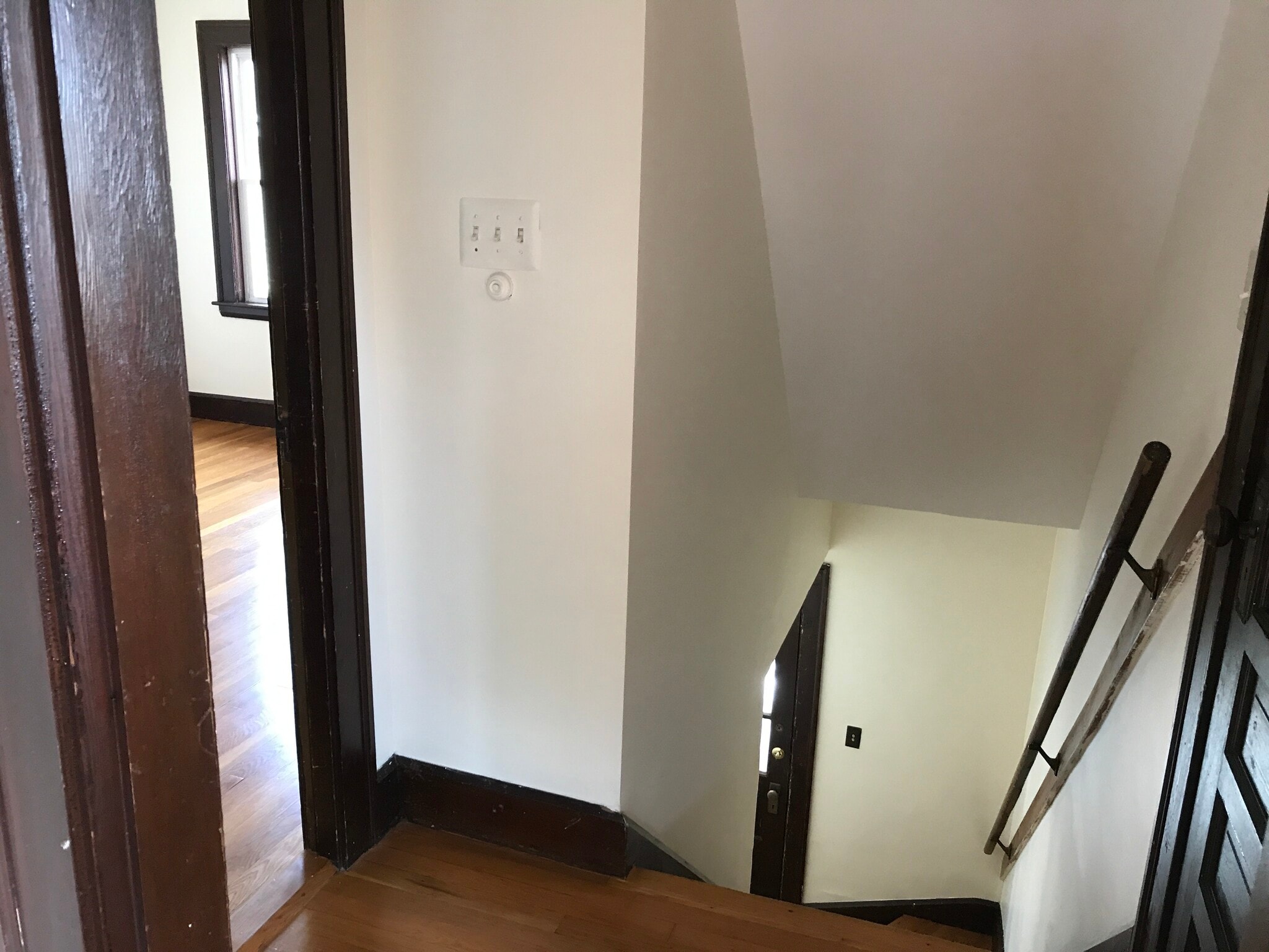 Front hallway steps. Enclosed front porch is to the right of these steps - 147 Farrington St