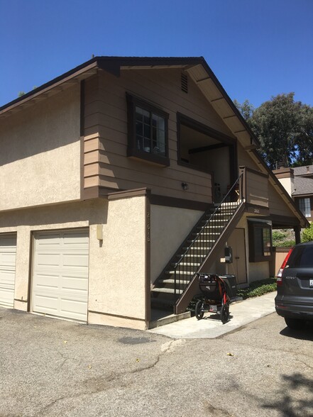 Living area is on the second level above the garage. One assigned parking spot included.... - 21616 Laurelrim Dr