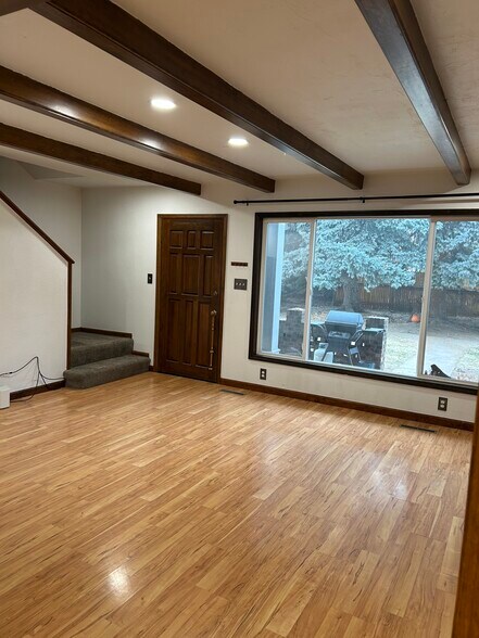Dining room leads into living room. Recessed lighting and dimmable switch - 435 E Drake Rd
