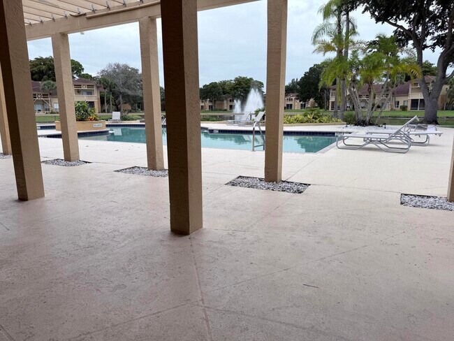 Building Photo - 4799 Via Palm Lakes