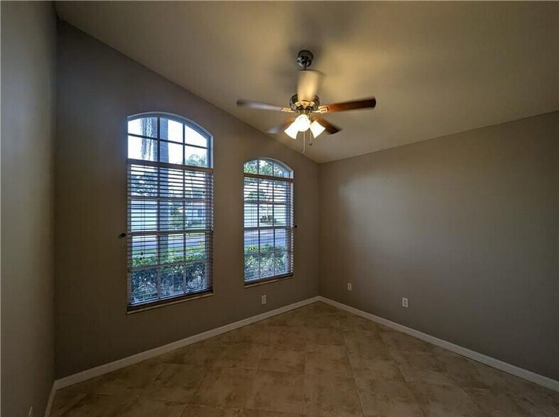 3rd bedroom with new tile and fixtures - 562 SW Saint Martins Cv