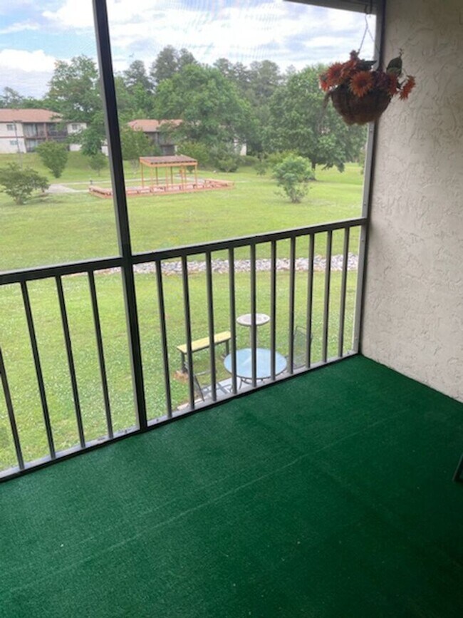 Building Photo - UPDATED CONDOMINIUM MOVE IN READY
