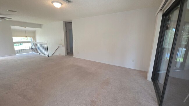 Building Photo - Beautiful Pond Front 2 Bedroom 2 Bath Townhome in the Wood Haven Community