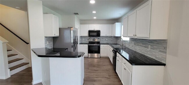 Building Photo - 9543 Maxson Dr