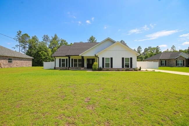 Building Photo - Enjoy Country Living with Modern Comforts!  3BR/2BA Home  with Granite Countertops, Covered Porch...