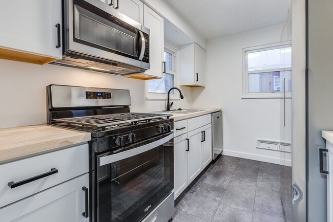 Building Photo - AVAILABLE JUNE 2026! - 2 Bedroom Suburban Vibes in the HEART of the City!!