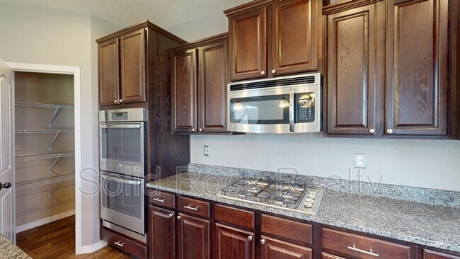 Building Photo - 8341 Needle Drop Ct