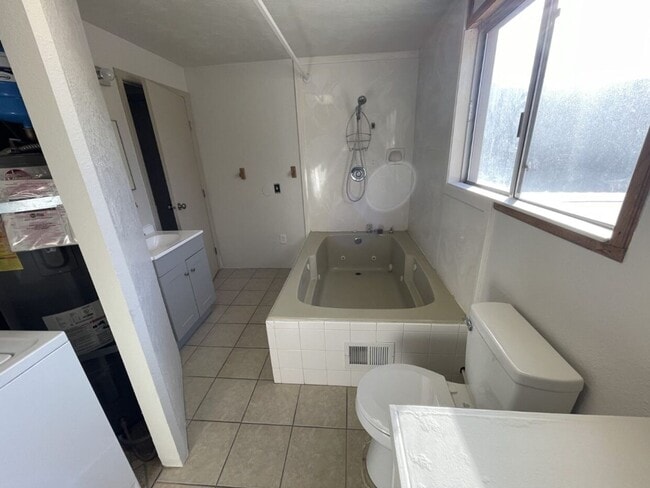 Building Photo - Beautifully Remodeled 3-Bedroom Home with Fenced Yard & Covered Parking