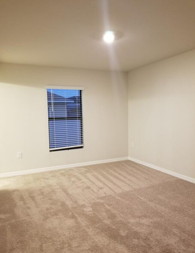 Building Photo - AVAILABLE NOW! NW CAPE CORAL - 3 Bedrooms - 2 Bathrooms - 2 Car Garage