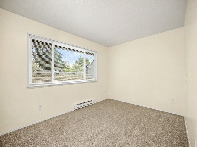 Building Photo - Spacious 2-Story Condo in a Quiet, Well-Located Community!