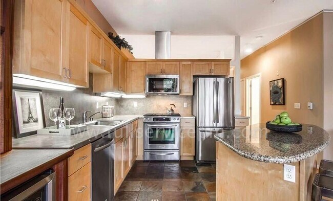 Building Photo - Stylish Capitol Hill Loft Condo w/ Floor-to-Ceiling Windows, Gas Fireplace