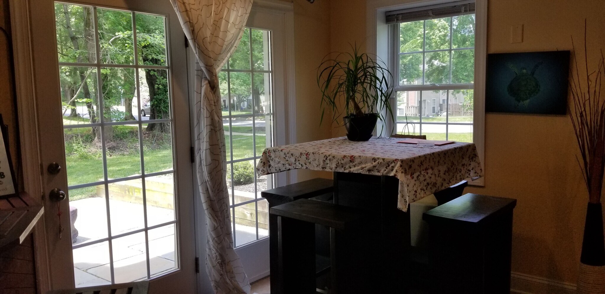 Breakfast nook opening on patio - 16114 Nursery Ln
