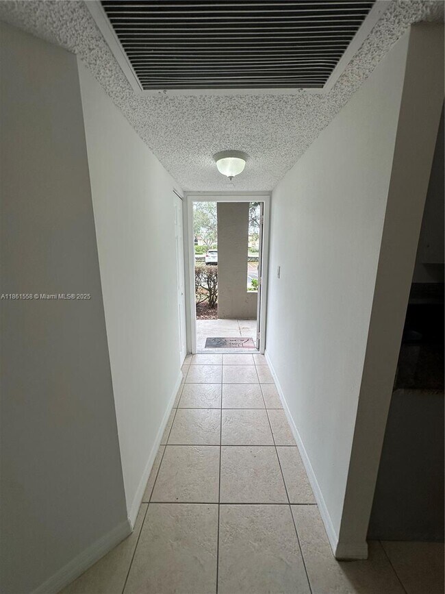 Building Photo - 11213 Royal Palm Blvd