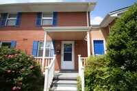 Building Photo - A brick townhouse steps from Lakewood shopping and dining — with everything already in it.