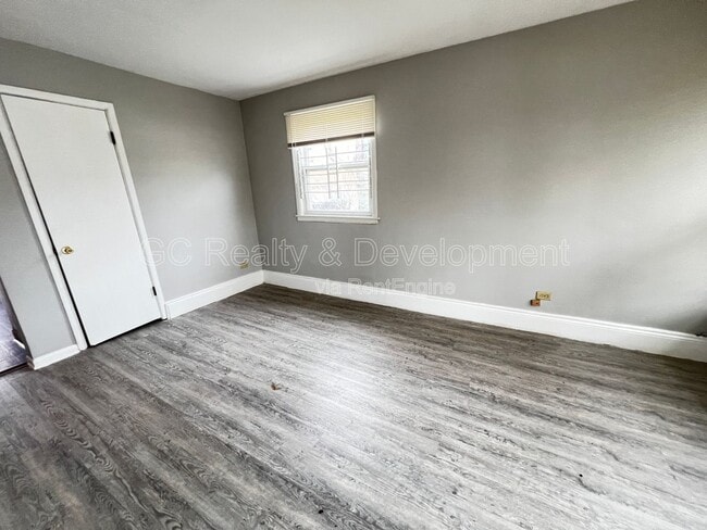 Building Photo - 9252 S Merrill Ave