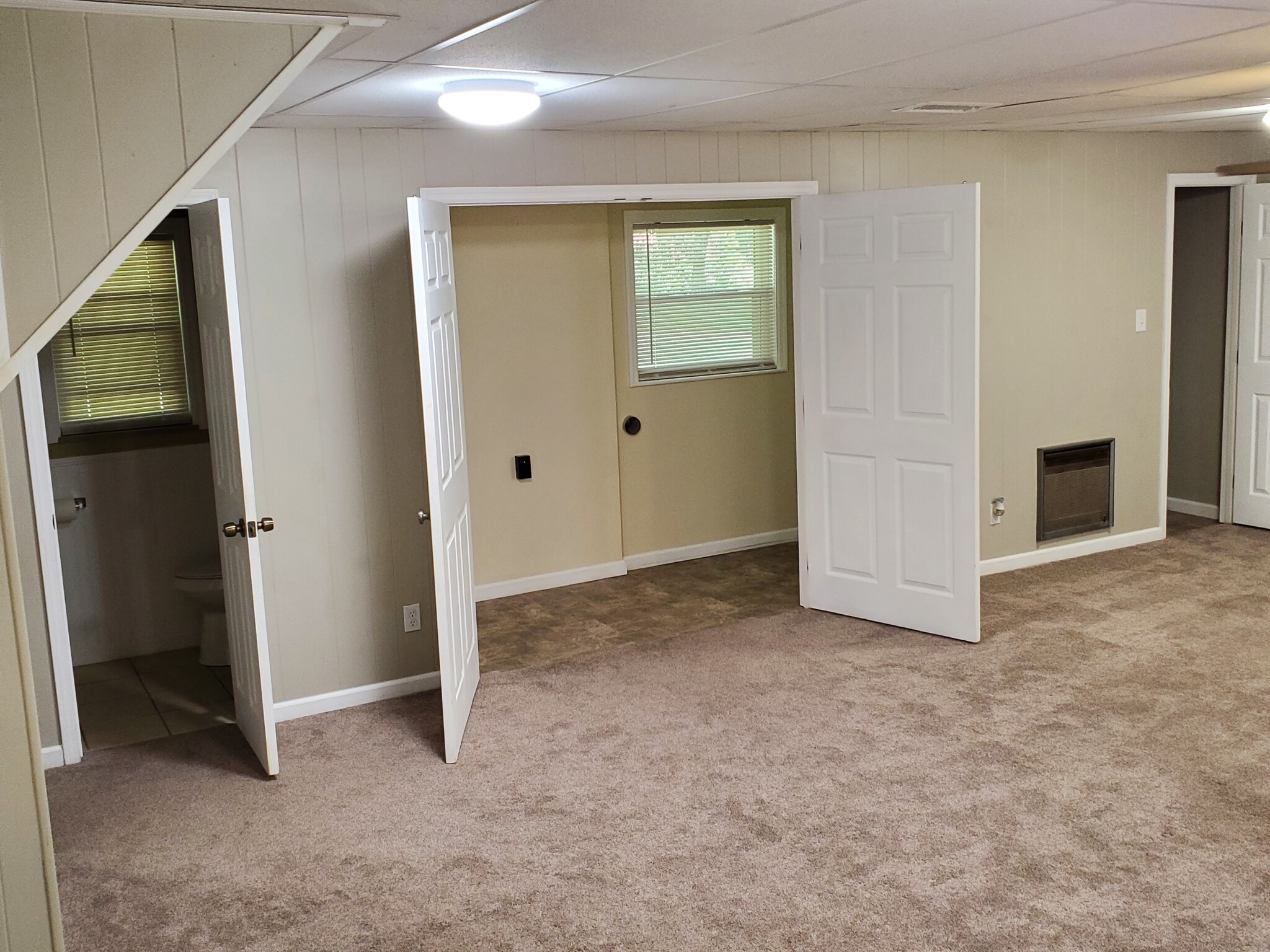 View of Laundry and Downstairs Bathroom From Downstairs Family Room - 4521 Mellowood Cir