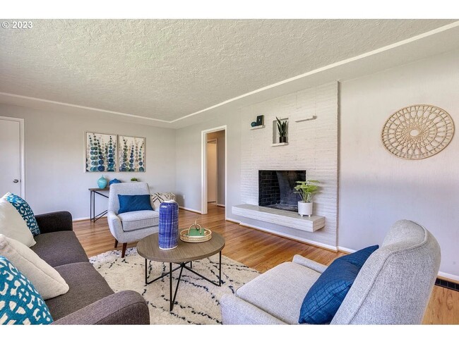 Building Photo - Stylishly Updated Mid-Century Gem on a Qui...