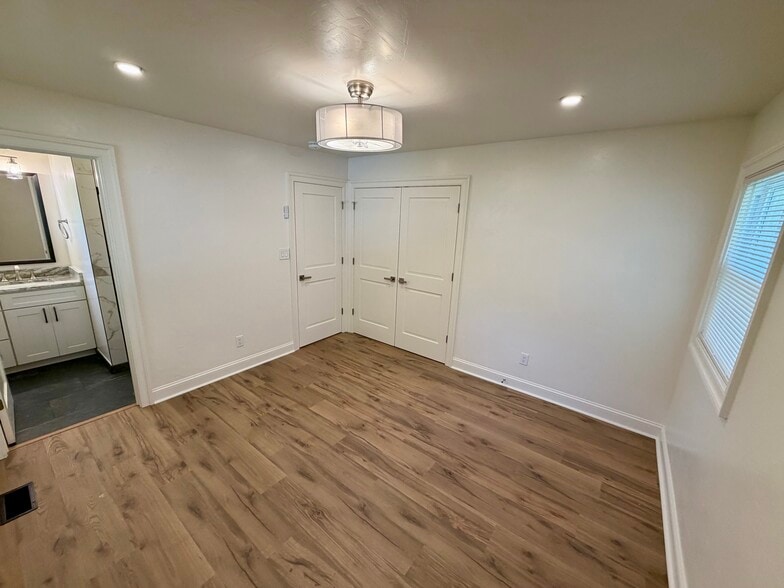 Primary bedroom with full en suite. - 329 Ronald Dr