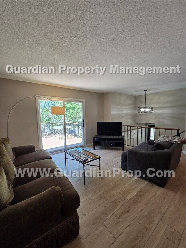 Building Photo - Chanhassen updated Townhome, Park view, 2 Car Garage, Large deck + Walkout Patio, available Aug