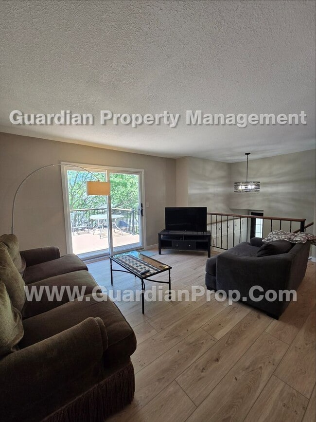 Building Photo - Chanhassen updated Townhome, Park view, Large private deck + Walkout Patio, available Aug