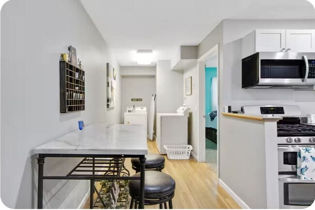 Building Photo - Furnished 3-Bedroom Apartment with Private Entrance and Free Laundry