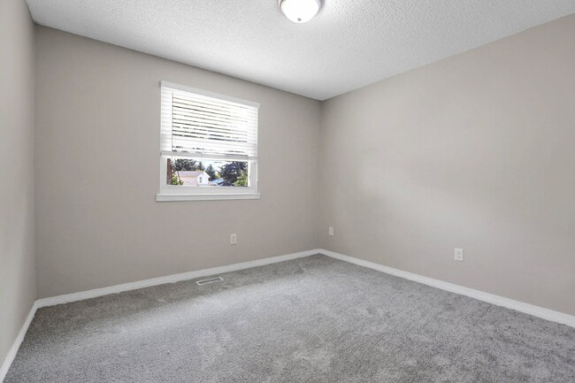 Building Photo - $2,720.95 - 4 bed, 2 bath, located in Aurora with attached Garage and In Unit Washer and Dryer!