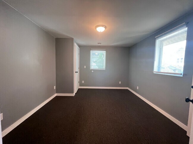 Building Photo - Upper Three Bedroom on NW Side of Grand Ra...