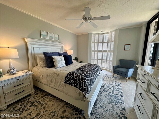 Building Photo - 6075 Pelican Bay Blvd