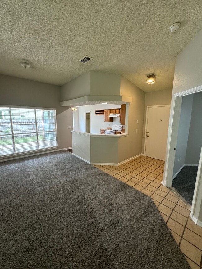 Building Photo - NICE 3 BEDROOM FEATURING WOOD VINYL PLANK ...