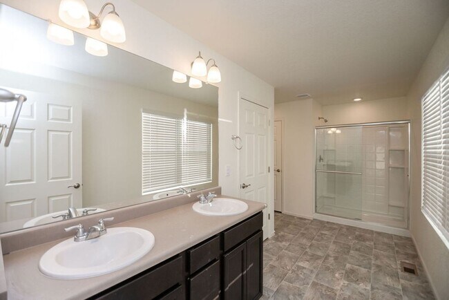 Building Photo - Spacious 4-Bedroom Home  + Office + Loft  with 3-Car Garage, Walk-Out Basement & Community Pool| ...