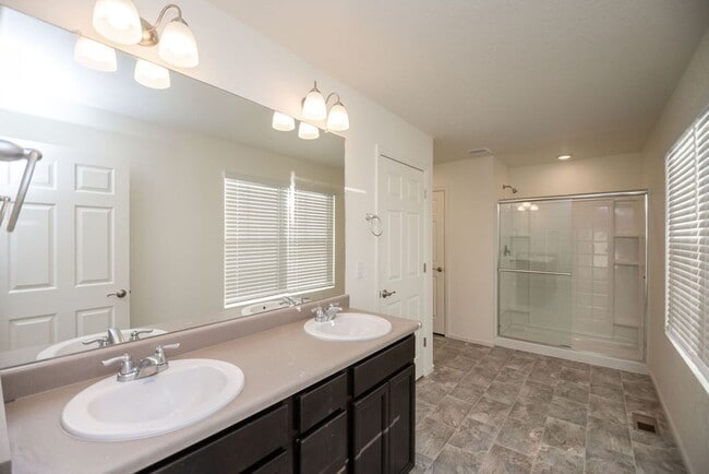 Building Photo - Spacious 4-Bedroom Home with 3-Car Garage & Walk-Out Basement | Prime Living Opportunity