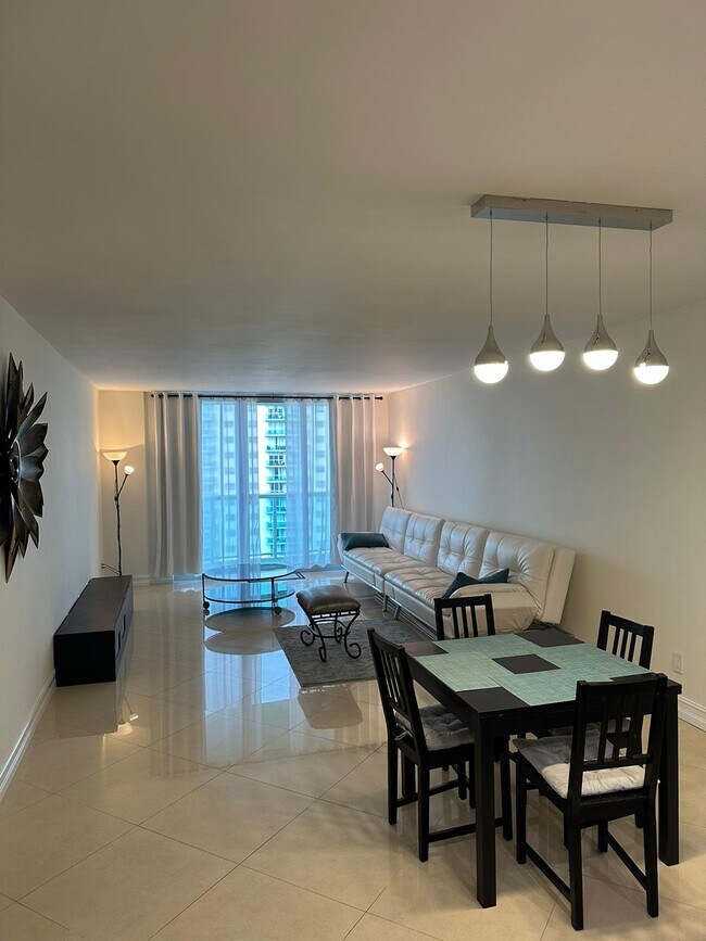 Building Photo - 19380 Collins Ave
