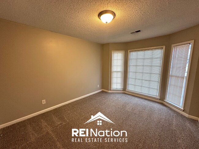Building Photo - CORDOVA COVE CHARMER! 3BR/2BA | High Ceilings & Brick Fireplace | 2-Car Garage!