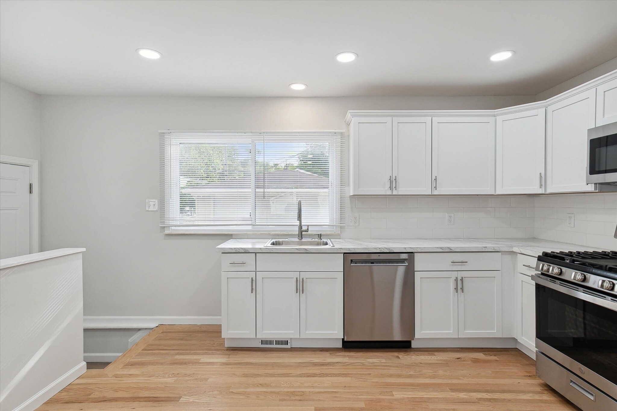 Plenty of counterspace and large kitchen window. - 9244 Northern Ave
