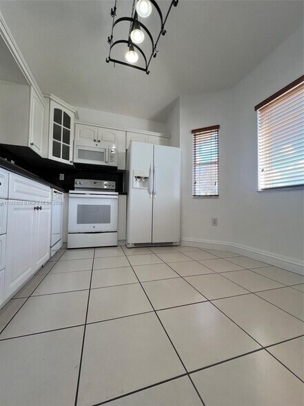 Building Photo - 6445 SW 130th Pl