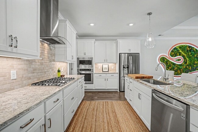 Building Photo - 3 BED | 3.5 BATHS | TWO CAR GARAGE | HERB RIVER | FURNISHED TOWNHOME