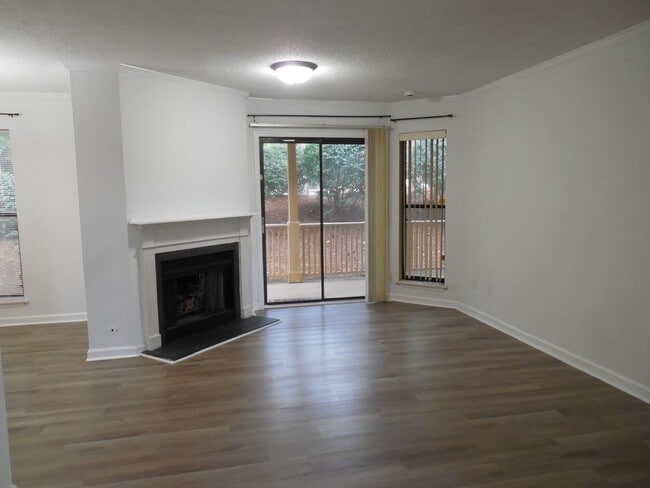 Building Photo - End Unit Condo Available now