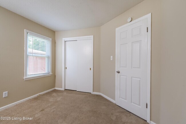 Building Photo - 8003 Canna Dr