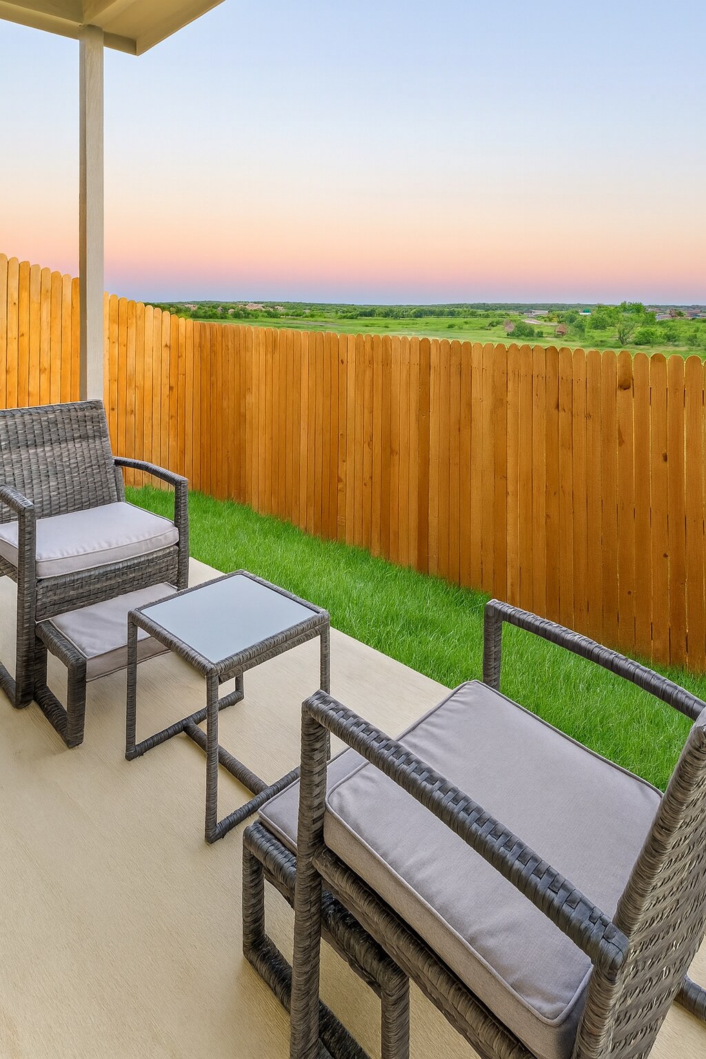 Relax in the back yard. This home is offered unfurnished. Staging furniture shown is not included. - 13810 Enzo Gate