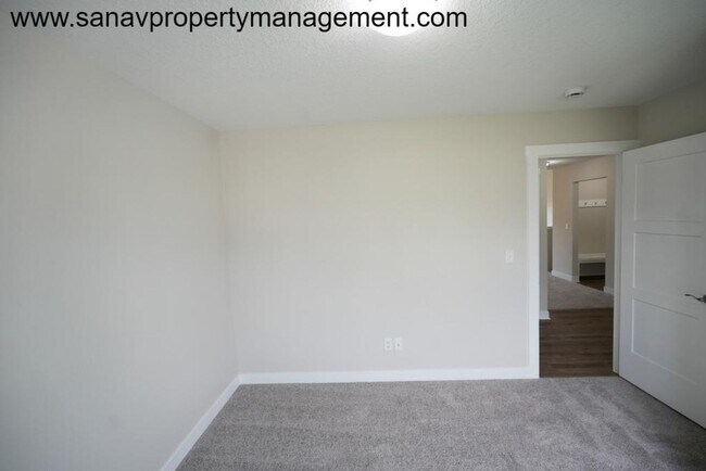 Building Photo - "Modern Comfort Meets Convenience: Your Ideal Home in Waukee"