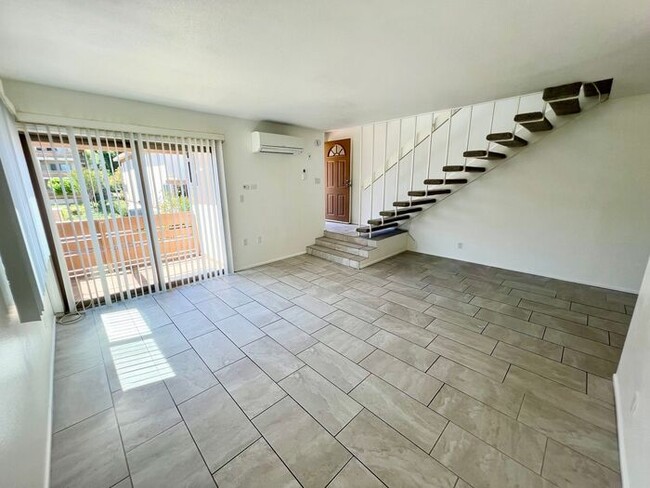 Building Photo - Spacious 2BR/1.5BA Townhome with A/C, Parking & Luxury Community Amenities