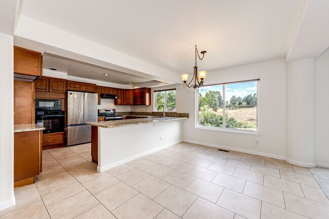 Building Photo - 9476 Morning Glory Way