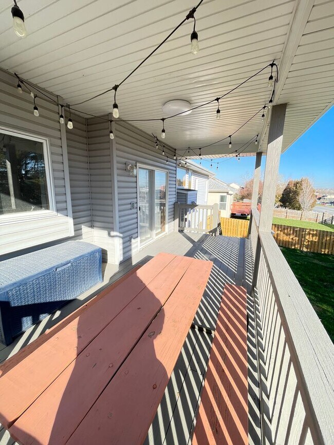 Building Photo - Northwest Omaha Gem: 2,700 Sq Ft, 3-Bedroom, Walk-Out Finished Basement, Fenced Yard, 3-Car Garag...