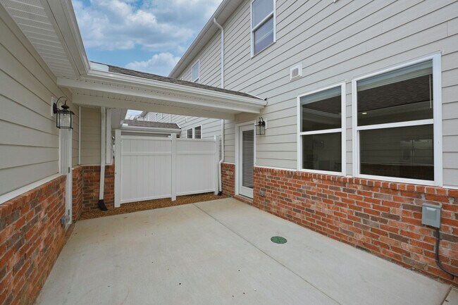 Building Photo - **BE THE FIRST PERSON TO LIVE IN THIS BRAND NEW BRICK TOWNHOME IN THE VILLAS AT REGAL SQUARE FEAT...