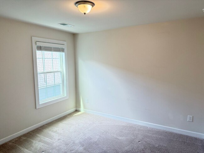 Building Photo - Beautiful Westbranch Home with 2-Car Garage, Covered Porch & Greenway Entrance Across the Street