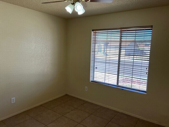 Building Photo - Four Bedroom Mountain View Home with large fenced back yard and double gates