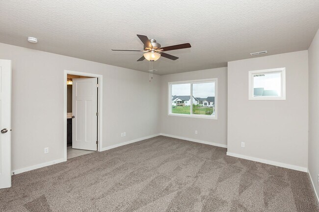 Building Photo - Prime Living: A Spacious Haven with Fenced Backyard in Ankeny