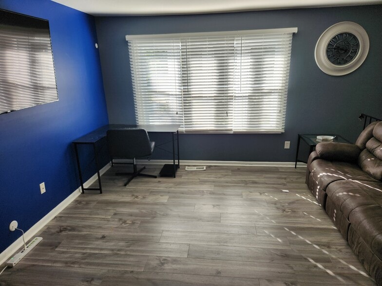 common area with couch/desk - 8917 Loughran Terrace