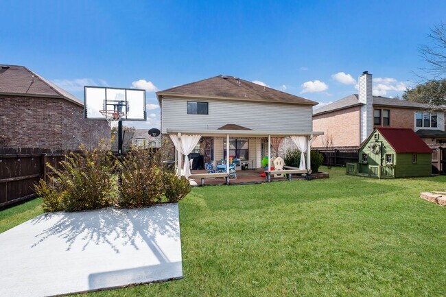 Building Photo - Patio Living with Basketball Court