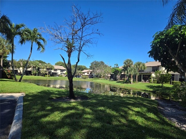 Building Photo - 4599 Carambola Cir S